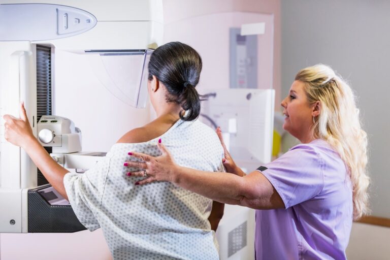 woman getting mammogram
