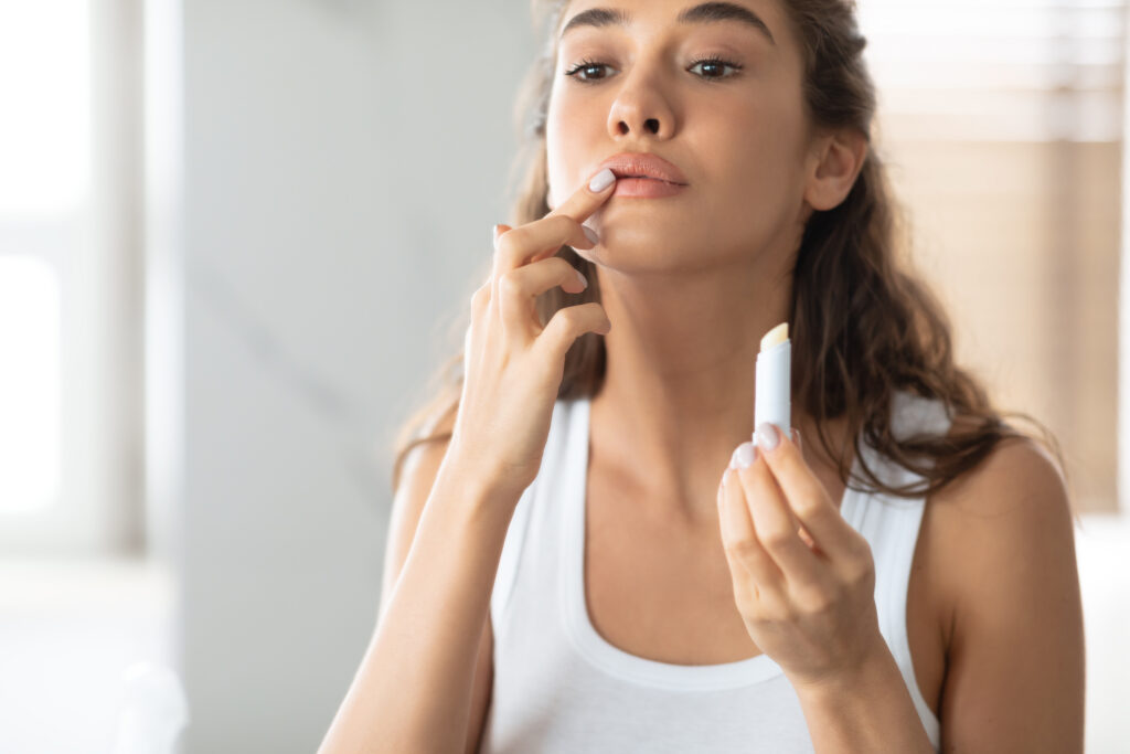 person applying makeup