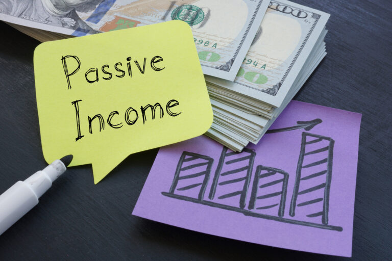 24 11 14 a pile of money with a sticky note that says passive income on it mf dload gettyimages 1346786874 1200x800 5b2df79