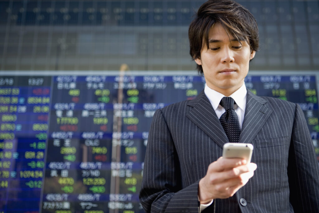 businessman checking his phone