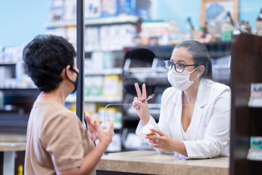 pharmacist talking to patient