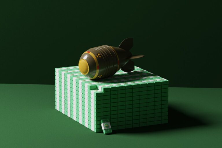 nuclear bomb on stacks of money