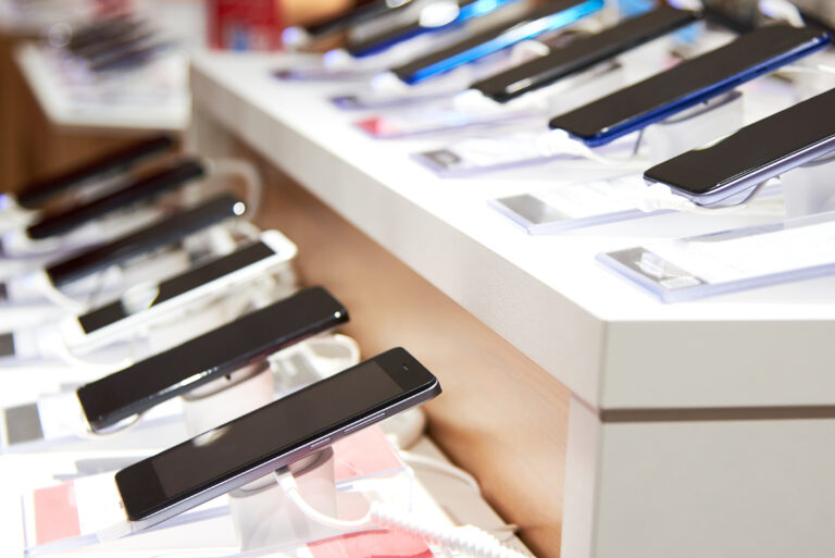 smartphones on display in mobile phone service store